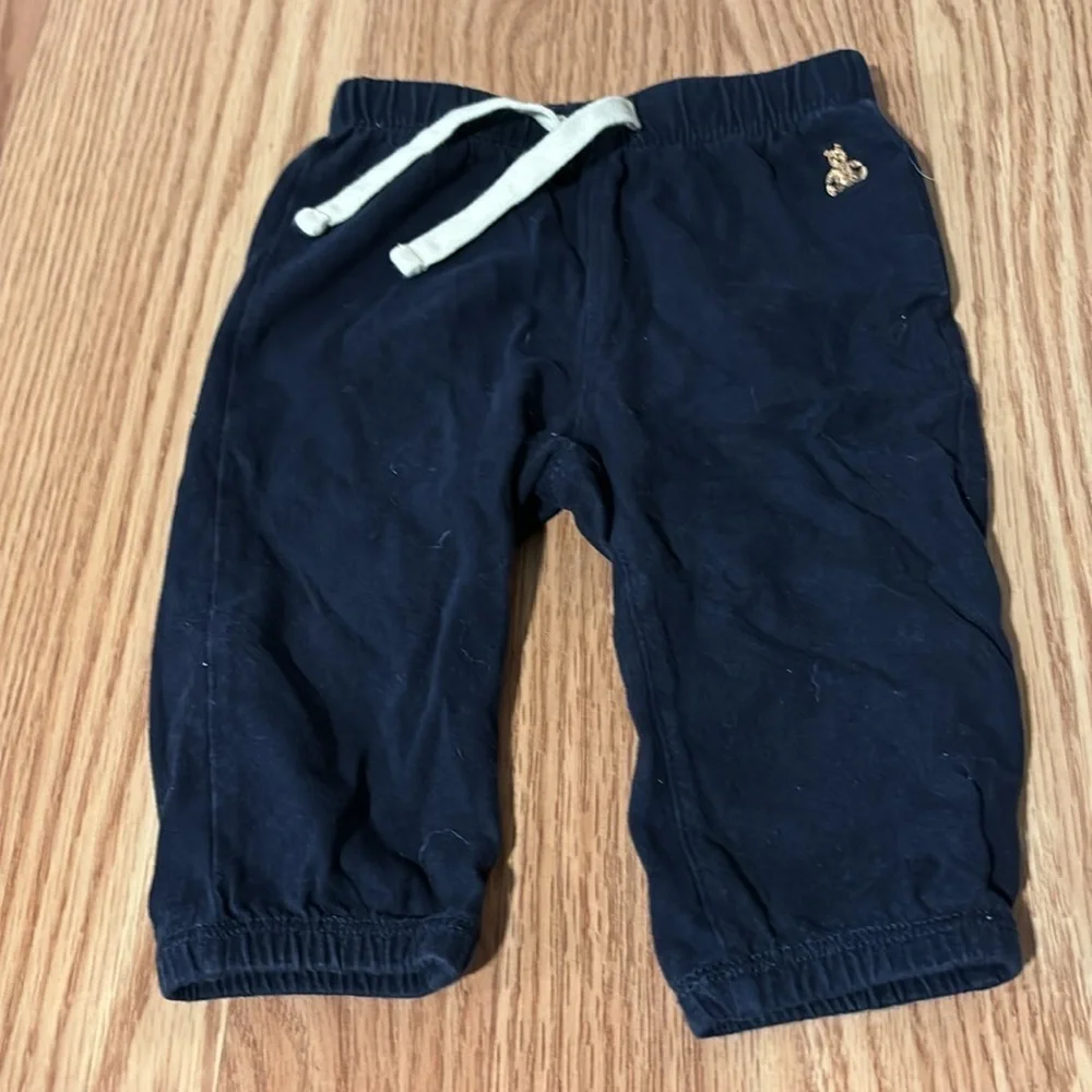 4 pairs of 6-9 month baby pants- blue and gray-